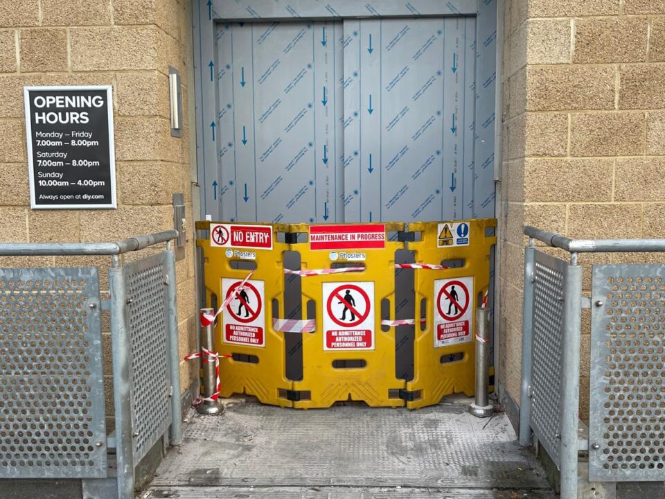 Lift landing closed with safety barriers while maintenance is in progress