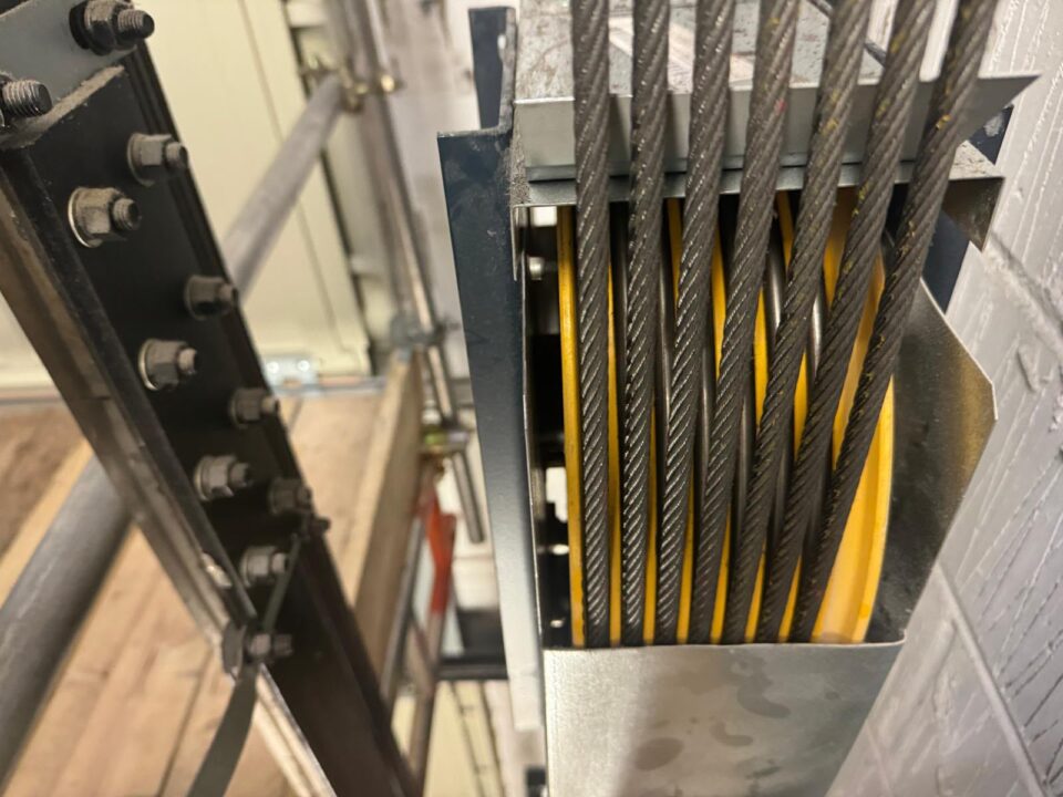 Lift ropes running over a sheave during engineering work